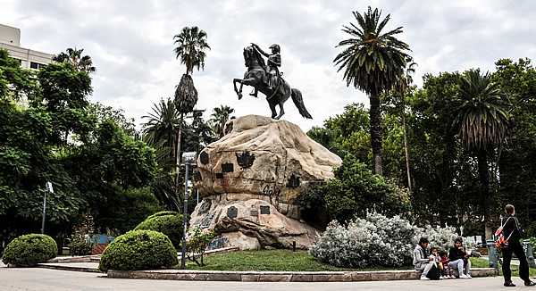 Statue of San Martin standing tall in the iconic Plaza San Martin of Mendoza, one of the best places to stay in the city. The historic square exudes charm and cultural significance, surrounded by top-notch accommodations. Immerse yourself in Mendoza's rich heritage and hospitality at its finest in this central location.