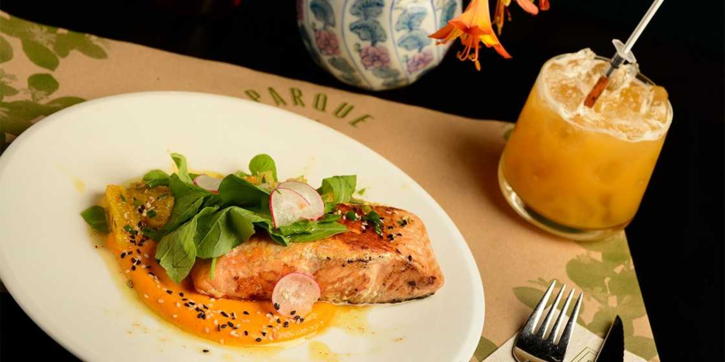 Image: Savory culinary delights in Mendoza showcased in this gourmet dish accompanied by a refreshing glass of juice. Immerse yourself in the culinary excellence and gastronomic wonders of Mendoza. Experience the perfect blend of flavors and culinary artistry in this captivating destination.