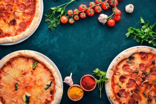 Image: Delicious assortment of pizzas, showcasing the culinary delights in Mendoza. Indulge in the authentic flavors and mouthwatering creations of Mendoza's pizza scene. Experience the perfect blend of local ingredients and culinary craftsmanship in this vibrant city.